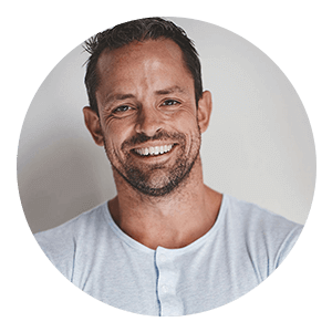 Smiling man in light shirt portrait